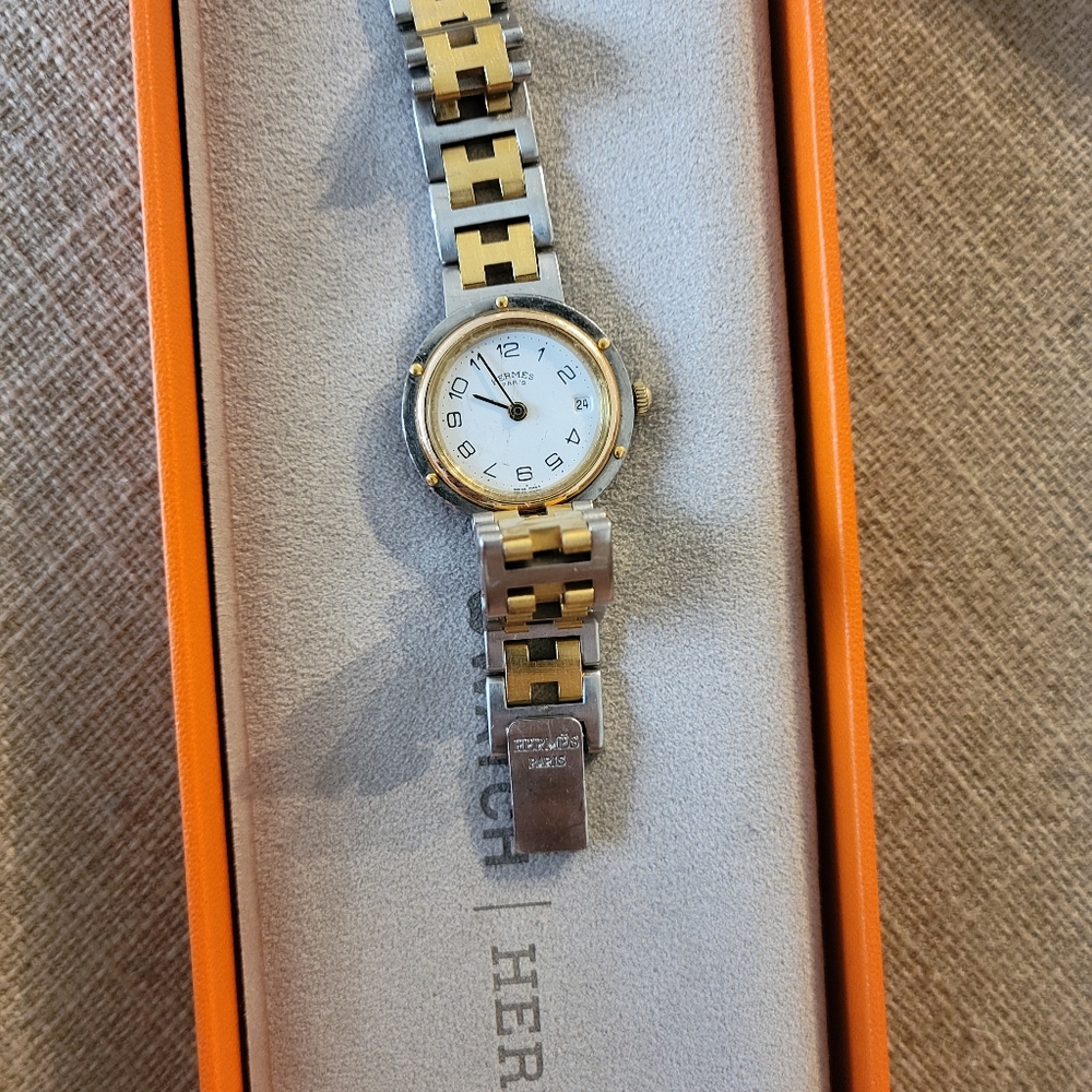 Authentic Hermes clipper quartz.